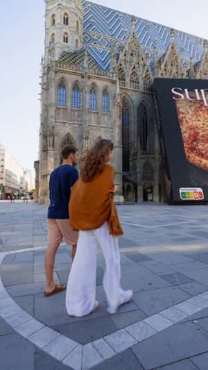 Pizza Box Leaning on the Church in a fake-out-of-home ad of Dr. Oetker
