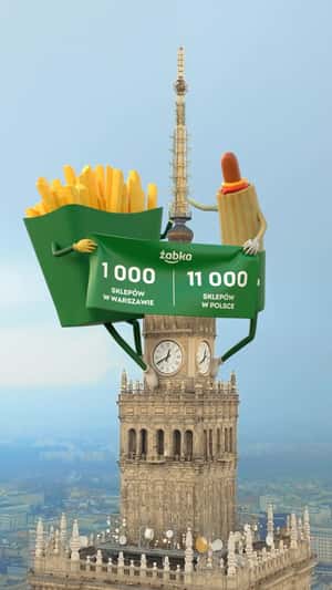 Mascots Climbs at the Skyscraper in a fake-out-of-home ad of Żabka
