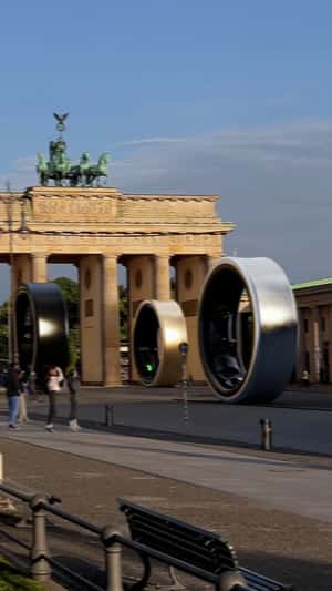 Giant Galaxy Ring Rolls at Brandenburg Gate in a fake-out-of-home ad of Samsung