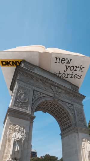 Book Flipping Above Arch Monument in a fake-out-of-home ad of DKNY