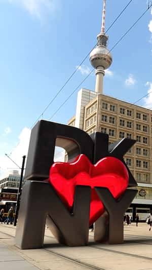 Heart Balloons Gathers on 3D Letters Installation in a fake-out-of-home ad of DKNY