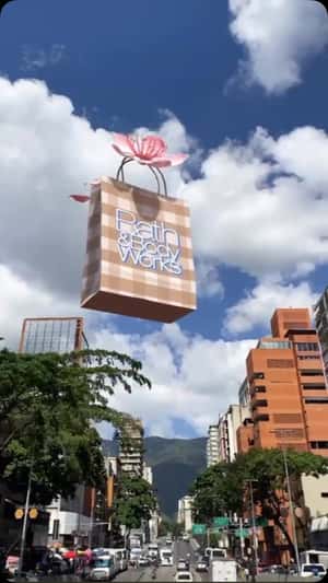 Paper Bag Releases Petals in a fake-out-of-home ad of Bath & Body Works
