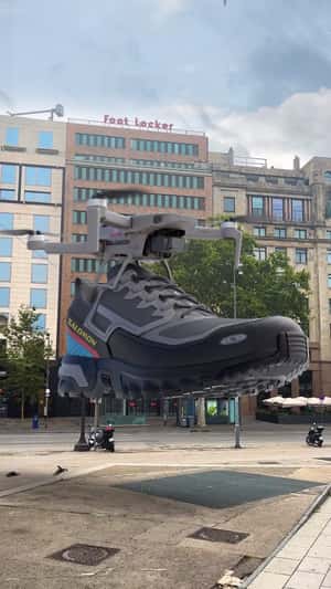 Sneaker Delivered by Drone at Plaza in a fake-out-of-home ad of Foot Locker