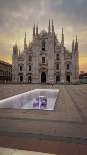 F1 Car Transformed into Football Shoe in a fake-out-of-home ad of PUMA