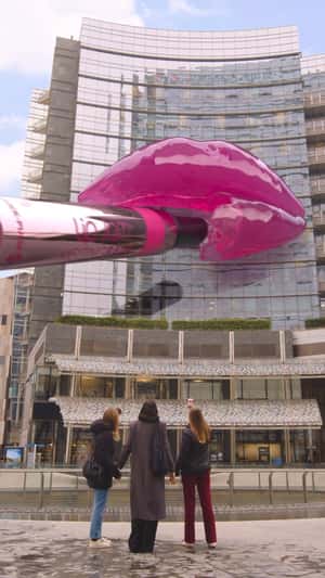 Lip Balm Colors Lips on Building in a fake-out-of-home ad