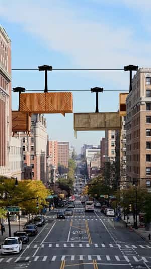Side Cabinets Glide Like Cable Cars in a fake-out-of-home ad of Room Lane