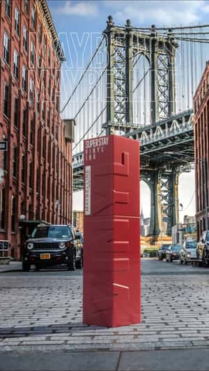 Dancing giant lipstick fake out of home ad of Maybelline New York