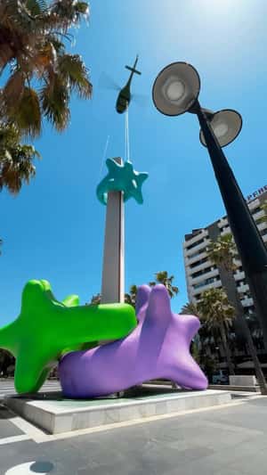 Rings Inserted into the Obelisk by Helicopter in a fake-out-of-home ad of TARTI