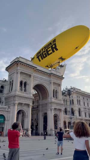 Airship Carrying Banner in a fake-out-of-home ad of Onitsuka Tiger