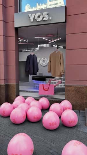 Sweater Conveyor Display at Store in a fake-out-of-home ad of YOS