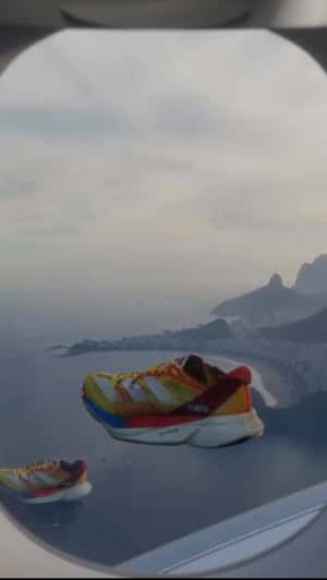 Running Shoes Gliding Alongside the Plane in a fake-out-of-home ad of Adidas