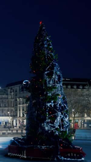 Black Slime Appears on Christmas Tree in a fake-out-of-home ad of Sky
