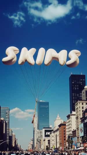 Brand Name Letter Balloons Floats in a fake-out-of-home ad of SKIMS
