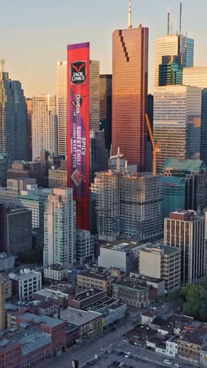 Tall Banner Display Along with Skyscrapers in a fake-out-of-home ad of Doritos