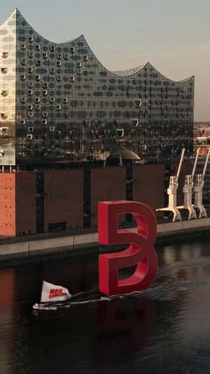 Logo Pulled by Speedboat in a fake-out-of-home ad of Breuninger