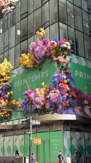 Spring Flowers Bloom at Department Store in a fake-out-of-home ad of Printemps