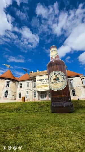 Bottled Beer Emerges From Castle in a fake-out-of-home ad of Birra Moretti
