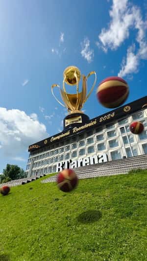 Trophy Unveiled Above the Arena in a fake-out-of-home ad of U-BT Cluj-Napoca