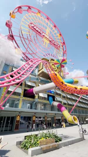 Amusement Park at Store Façade in a fake-out-of-home ad of Samaritaine Paris