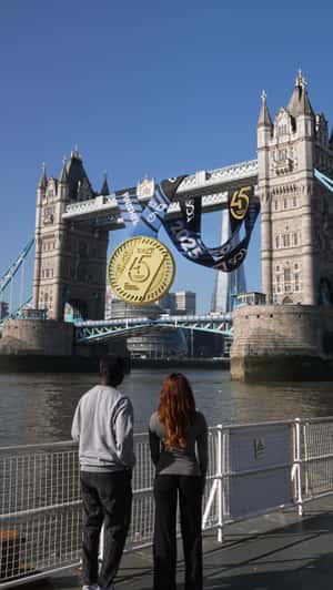 Finisher Medal Hangs on Bridge in a fake-out-of-home ad of London Marathon