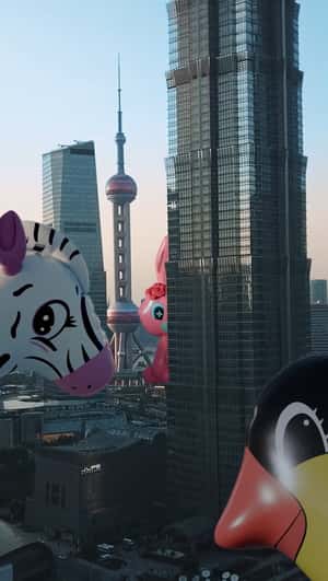 Inflatables in Shanghai Women’s Voyager Show in fake-out-of-home ad of Louis Vuitton