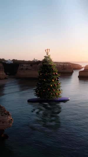 Christmas Tree Rides on Paddle Board in a fake-out-of-home ad of Club Med