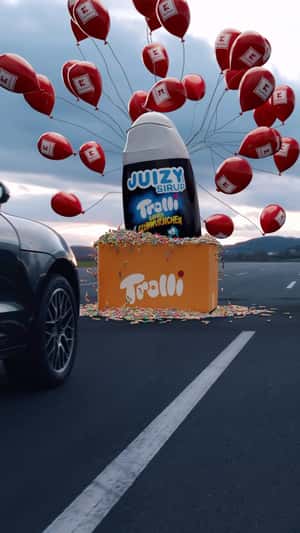 Box Overflowing with Gummies in a fake-out-of-home ad of Kaufland