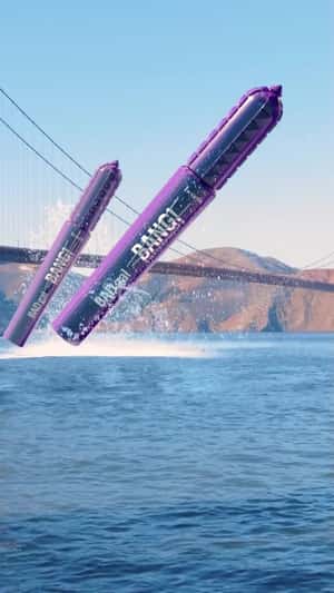 Mascaras Leaps Out From the Waters in a fake-out-of-home ad of Benefit