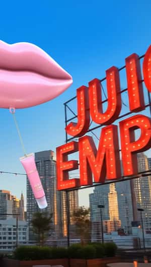 Pink Lip Balloon Carries Lip Gloss in a fake-out-of-home ad of Lancôme