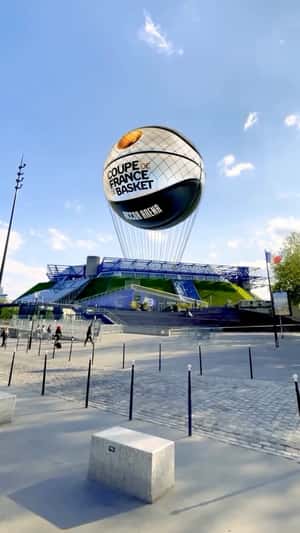 Basketball on Net Floats at Arena in a fake-out-of-home ad of FFBB