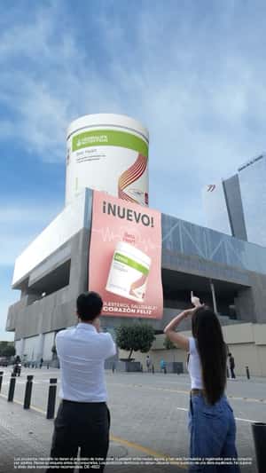 Supplement Jar Drops at Rooftop in a fake-out-of-home ad of Herbalife