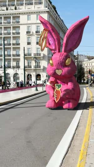 Bunny Mascot Rolls on Street in a fake-out-of-home ad of Anna Maria Mazaraki