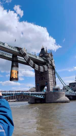 Gru's scarf in Tower Bridge in fake-out-of-home ad by Universal Pictures