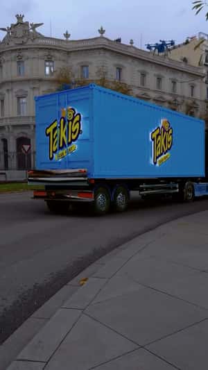 Drones Accompanying Container Truck in a fake-out-of-home ad of Takis