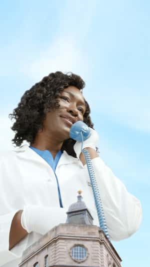 Rotary Dial Telephone on the Street in a fake-out-of-home ad of Dr. Simi