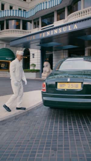 Balloons Float From Car Trunk in a fake-out-of-home ad of The Peninsula