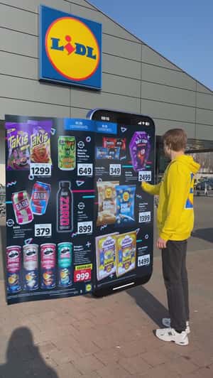 Phone Screen Flips Like Paper in a fake-out-of-home ad of Lidl