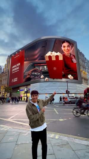 Popcorn Emerges From Digital Screen in a fake-out-of-home ad of Turkish Airlines