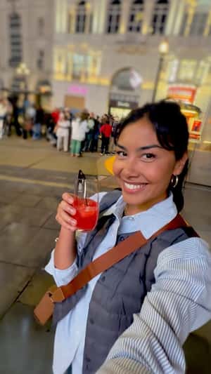 Drinks on Tray Emerge from Screen in a fake-out-of-home ad of Turkish Airlines