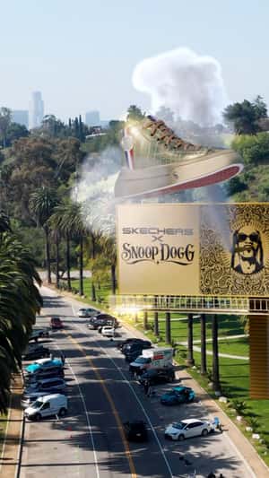 Smoke Reveals Sneaker from Billboard in a fake-out-of-home ad of Snoop Dogg