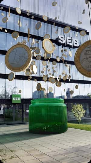 Coins On Thread Hangs Above A Jar in a fake-out-of-home ad of SEB
