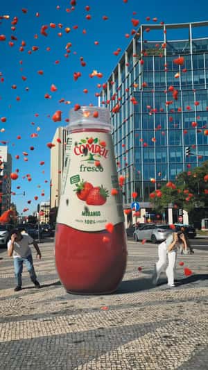 Bottle Releases Strawberry Slices in a fake-out-of-home ad of Compal