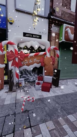 Gingerbread Holds Cola Bottle in a fake-out-of-home-ad of The Jailhouse Belfast