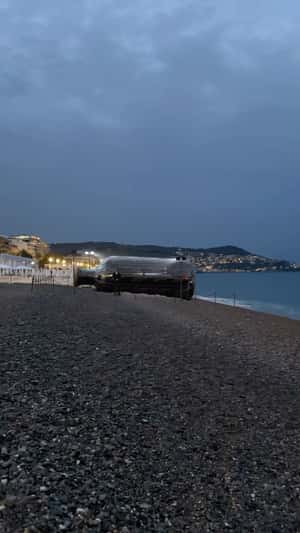 Guarded Treasure Bottle at Shore in fake-out-of-home ad of Mercedes AMG