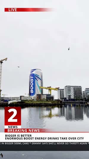 Towering Cans Spotted Around the City in a fake-out-of-home-ad of Boost Drinks