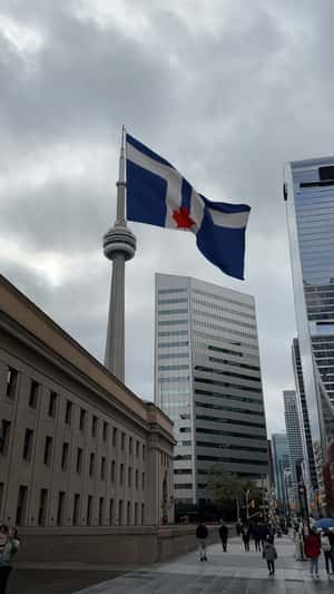 Flag Waving Flag on CN Tower in a fake-out-of-home ad of Toronto Flag