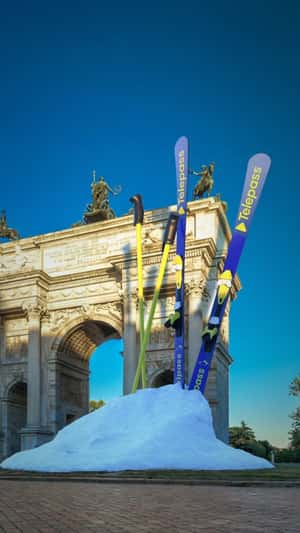 Ski Skates and Poles at Arc de Triomphe in a fake-out-of-home ad of Telepass