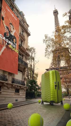 Tennis Balls Bounce Around Suitcase in a fake-out-of-home ad of Samsonite