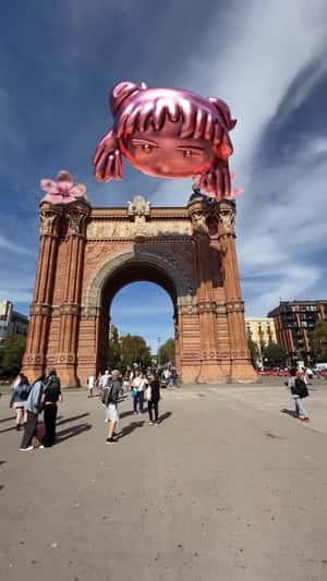Face Balloon Float Under the Arc in a fake-out-of-home ad of Bianca Adam