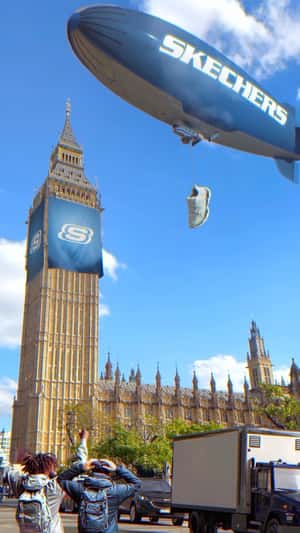 Airship Drops Shoe on Double-decker Bus in a fake-out-of-home ad of Skechers